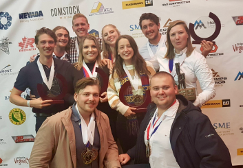 UQ students with their trophies at the international mining games